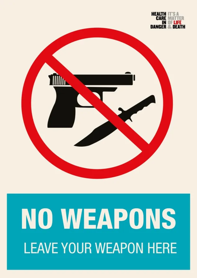 Healthcare in Danger signage saying "No Weapons - Leave Your Weapon Here"