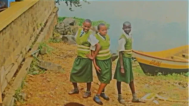Early school years in Uganda, full of hope and discovery at a school tour.