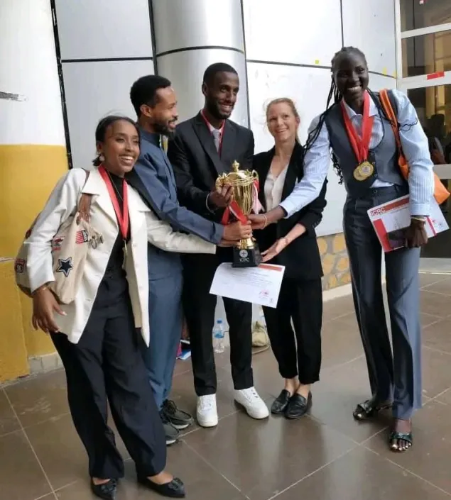 Nyamal with her team at the IHL National Moot Court competition in Gondar, representing Hawassa University, in May 2025.