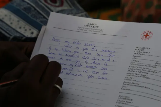 Restoring Family Links messaging facilitated by Nigeria Red Cross volunteer
