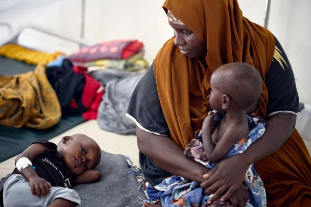 Sabirin Abdi Idris with her two sons
