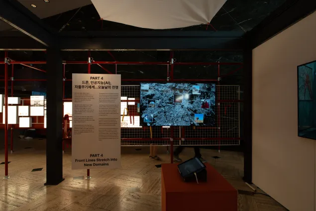 A section of the exhibition showing Part 4 titled "Front Lines Stretch into New Domains"