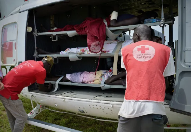 2026. South Sudan Red Cross Society volunteers assisting patients before they are evacuated to Juba.