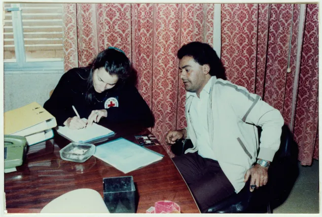 An ICRC delegate verifies the reintegration conditions of former prisoners of war through private, one-on-one interviews conducted without witnesses.