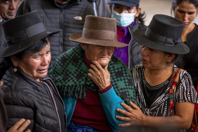 The ICRC helps families of missing persons from the 1980-2000 violence era by addressing their needs through humanitarian efforts in the country. ICRC Three women whose family members are missing.