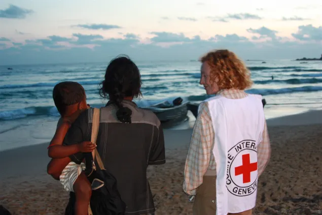 A woman evacuated from the war zone awaits her husband's arrival in Trincomalee, Sri Lanka. Zurab Burduli/ICRC A woman evacuated from the war zone awaits her husband's arrival in Trincomalee, Sri Lanka.