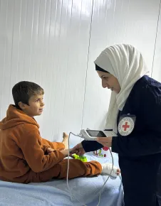 Hasakeh Governorate, Al-Hol camp, hospital. Hamzah, 8, is being treated for internal foot erosion.