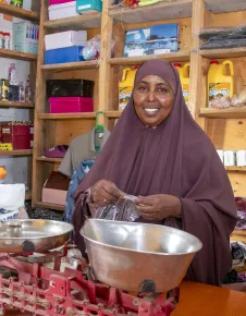 Photo of beneficiary in her ICRC supported shop