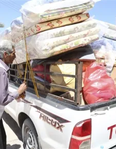 Misrata, ICRC sub-delegation warehouse. A staff from the Libyan Red Crescent is preparing an ICRC essential household items distribution for people displaced from Sirte.