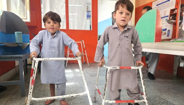 Little Mohabbatullah and Yusuf, both battling cerebral palsy, continue receiving care at the ICRC’s physical rehabilitation centre in Kabul