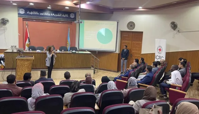 People gathering in a conference room 