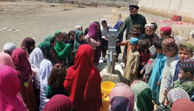 Children gather to collect drinking water in Khohseen village, Sayed Karam district, Paktia province