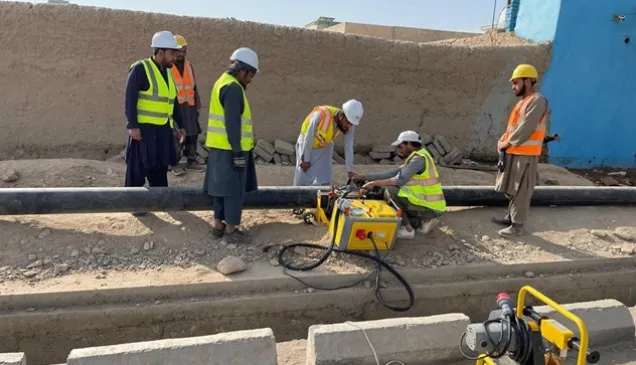Construction workers during the installation of the new HDPE pipes in Kandahar city
