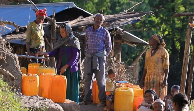 people collecting water from a water point in Lalibela town.