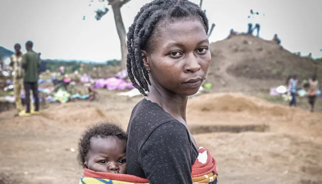 Daniela Mapendo Santana, a refugee from DRC, with her child. Daniela was separated from her family while fleeing violence in DRC. Daniela Mapendo Santana, a refugee from DRC, with her child. Daniela was separated from her family while fleeing violence in DRC.