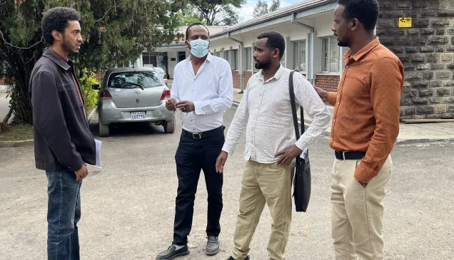 Doctors attending the training in brief discussion with ICRC representative.JPG