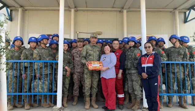 Kath Stewart, the ICRC’s Regional Coordinator for Armed and Security Forces in the Asia-Pacific, with Chinese Platoon at Khaan Quest 2025. 
