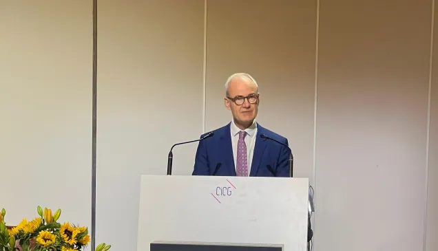 ICRC Vice President Giles Carbonnier stands behind podium delivering statement 
