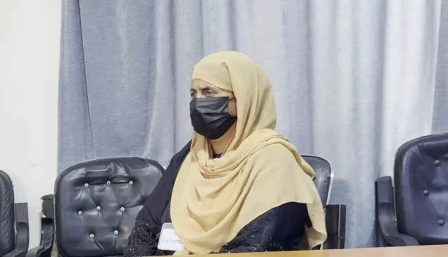 Aziza*, who was recently reconnected with his son, pictured at the ICRC's office in Kabul