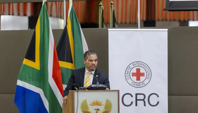 Alvin Botes speaking at the Global High-Level Initiative event on IHL in Pretoria