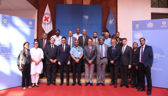 Dignatories, facilitators and organizers pose for a group photo