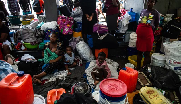People who fled their homes due to armed confrontation in Carrefour Feuilles and Solino neighborhoods and took refuge in abandoned theater and building in downtown Port-au-Prince.