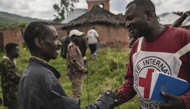 Nakiele, South Kivu, Democratic Republic of the Congo. The ICRC meets with members of armed groups to discuss the humanitarian consequences of violence, compounded by outbreaks of malaria and Ebola, in the village. IDPs and their host communities learn how to reduce their exposure to these diseases thanks to ICRC- organized awareness campaigns, and/or obtain treatment at an ICRC- supported health centre.