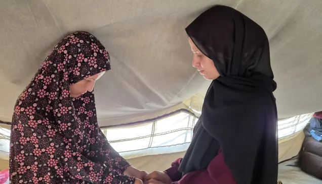 Lina Al Kurdi and her sister, Reem Al Kurdi, have been living together in an IDP camp in Deir Al Balah for a year after moving several times in different locations. Lina and Reem are the main support to each other now.