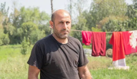 Anar, is a mine victim. Two of Anar's brothers in front of  his young nephew were killed by an explosion when they unknowingly went into a mine-contaminated area. When Anar and his father rushed to help, a second explosion severely injured Anar and he lost a leg.