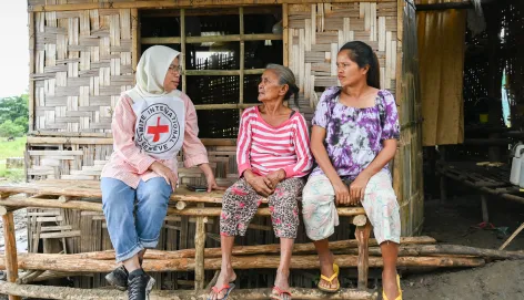ICRC protection field officer Raidah Latip talks with conflict-affected people in Maguindanao del Sur