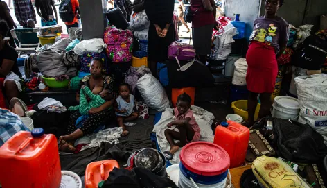 People who fled their homes in the Carrefour Feuille neighborhood because of recent attacks by armed gangs took refuge in a gas station, in Port-au-Prince, Haiti, on March 19, 2025.