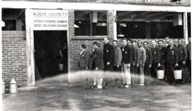 World War II. Drancy. Camp for Jewish civilian internees. Waiting in front of the kitchen at mealtime. Copyright ICRC