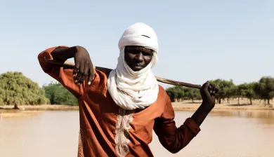 person standing in the heat