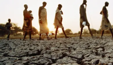 Draught, people walking on sand