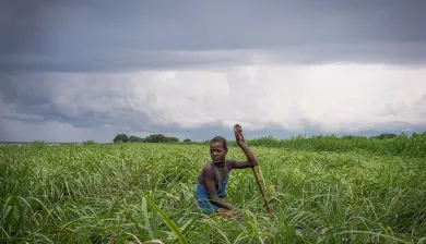 South Sudan - Young man in a grass field