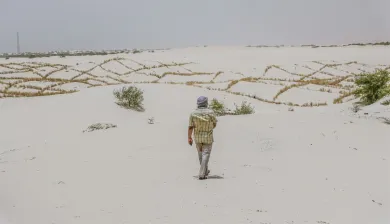 Mali person walking in the drought 