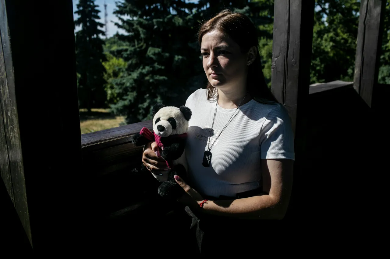 Liudmyla Sidko clutches a small teddy bear puppet, the final gift from her husband Vitalii before he returned to the frontlines.
