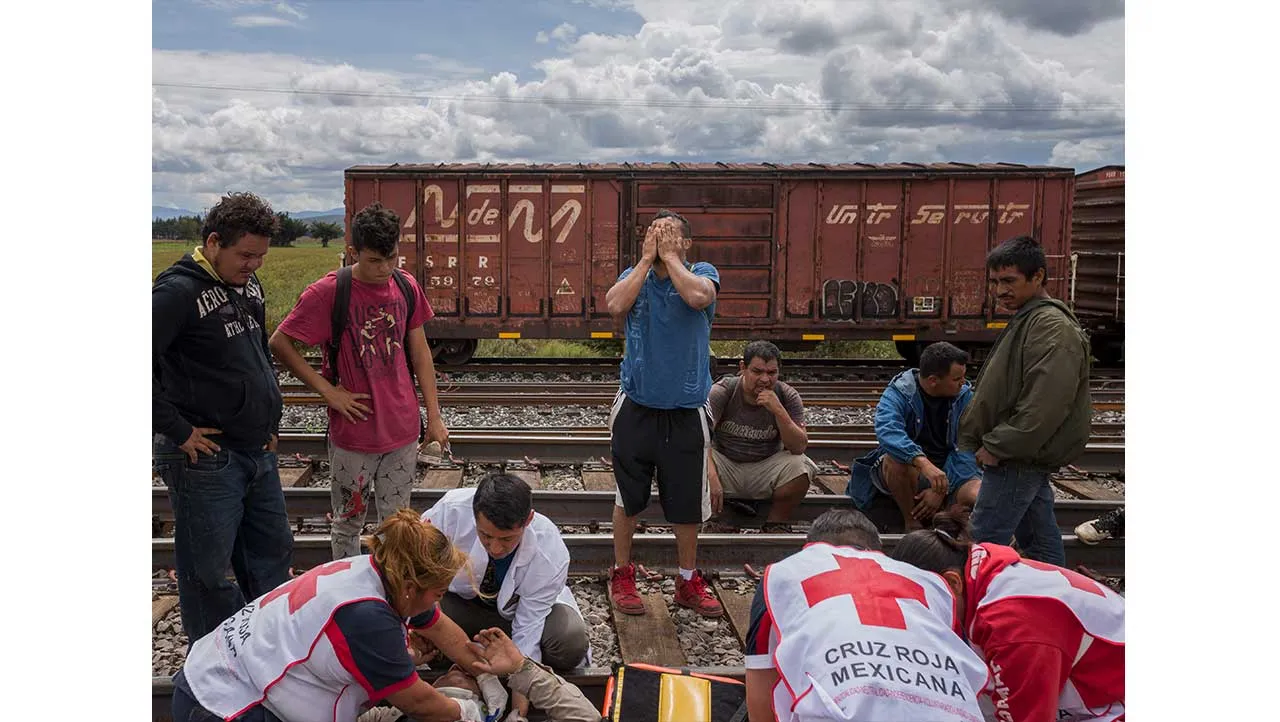 migrant who got hurt while trying to catch a moving train. migrant who got hurt while trying to catch a moving train.