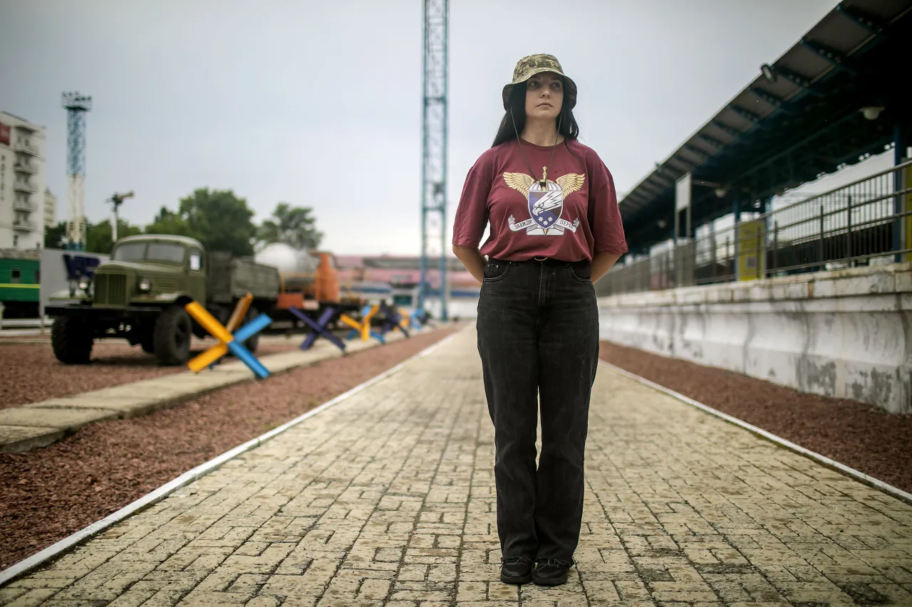 Olena Masliuk standing at the train station