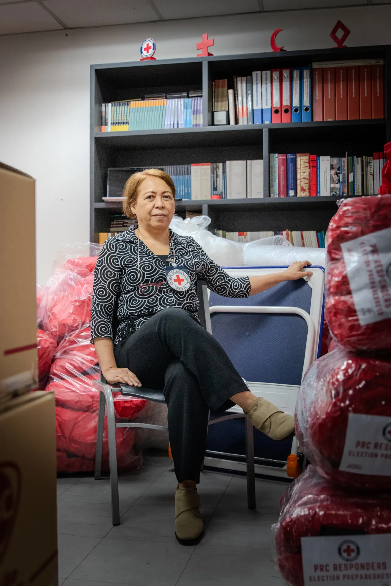 Mariegen Balo inside a room at the Philippine Red Cross headquarters. 
