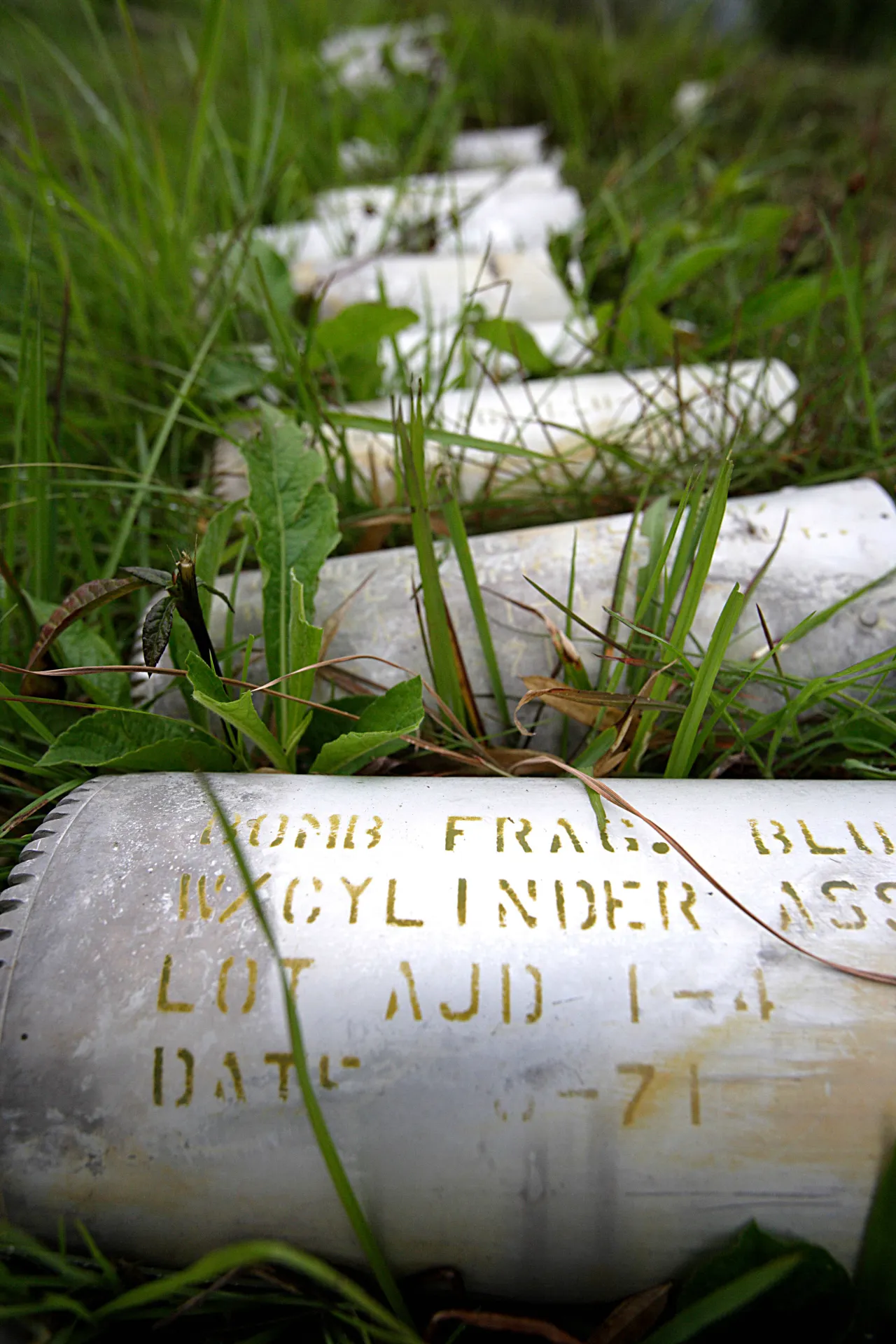 Phonsavan, Xieng Khouang province, UXO Lao field office. Cluster munitions still intact in their cases, which failed to explode.