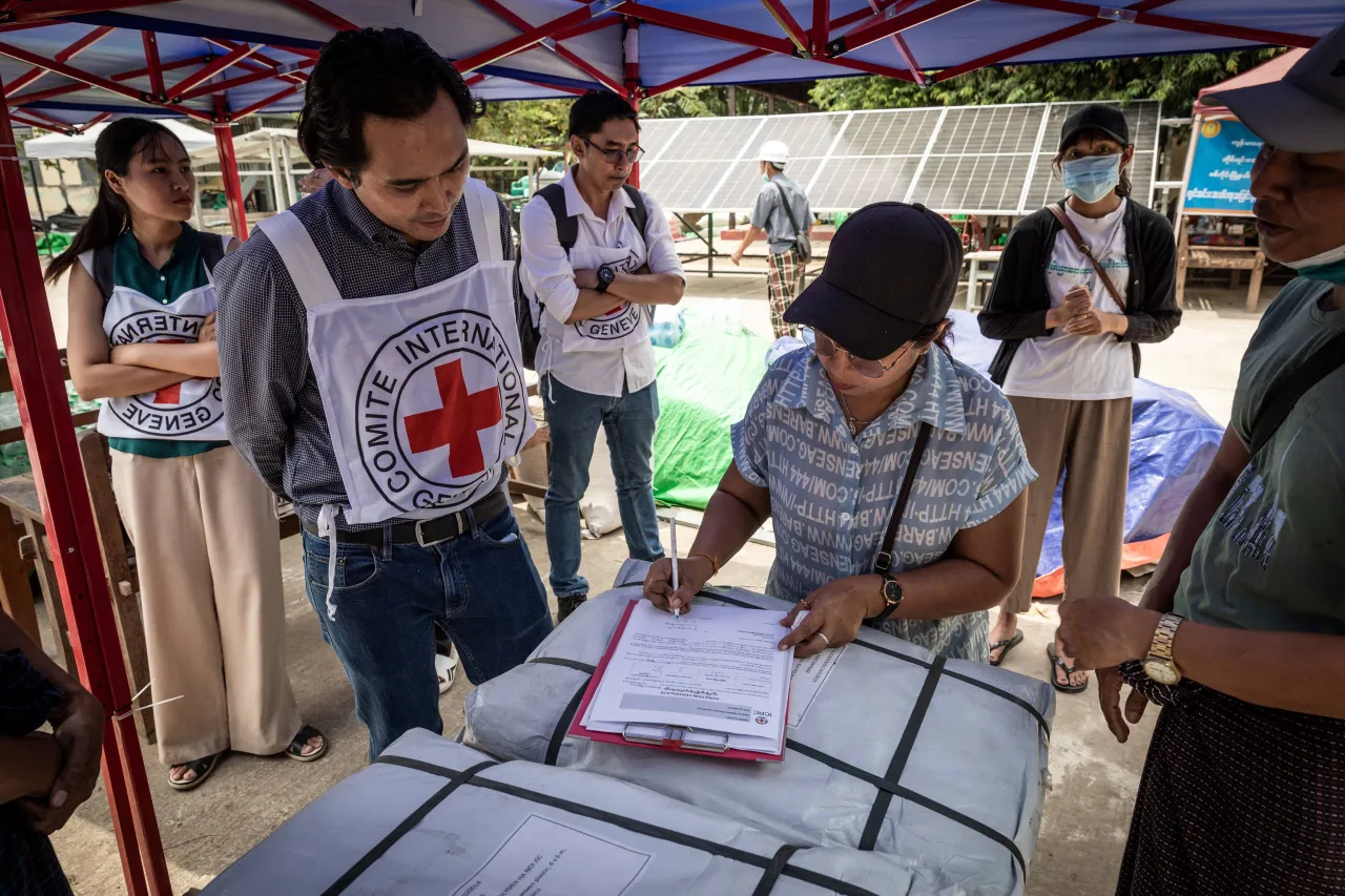 Economic security field officer explains how ICRC will support a community currently hosted at a local school in Sagaing, Myanmar. 