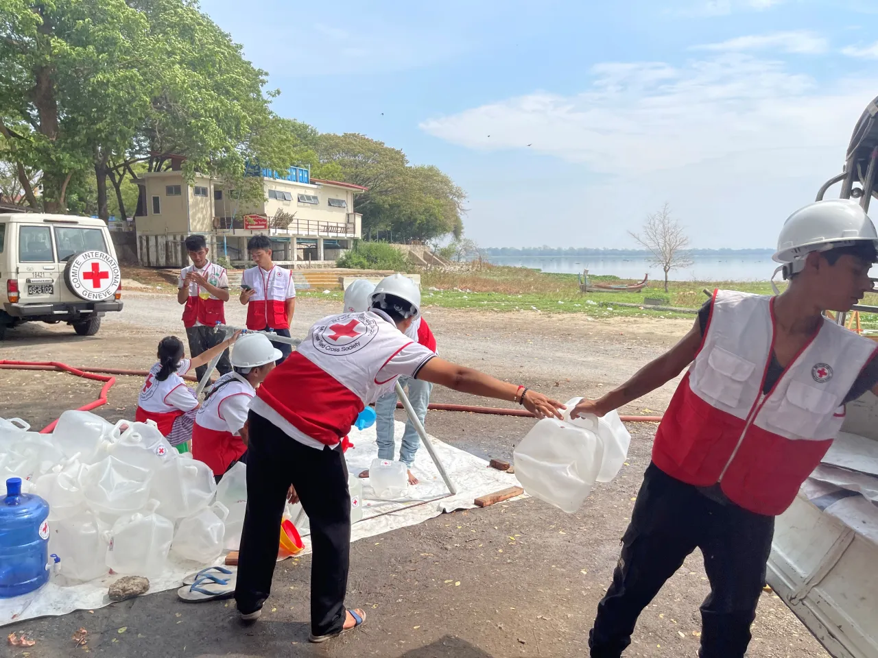 Red Cross staff at a water distribution