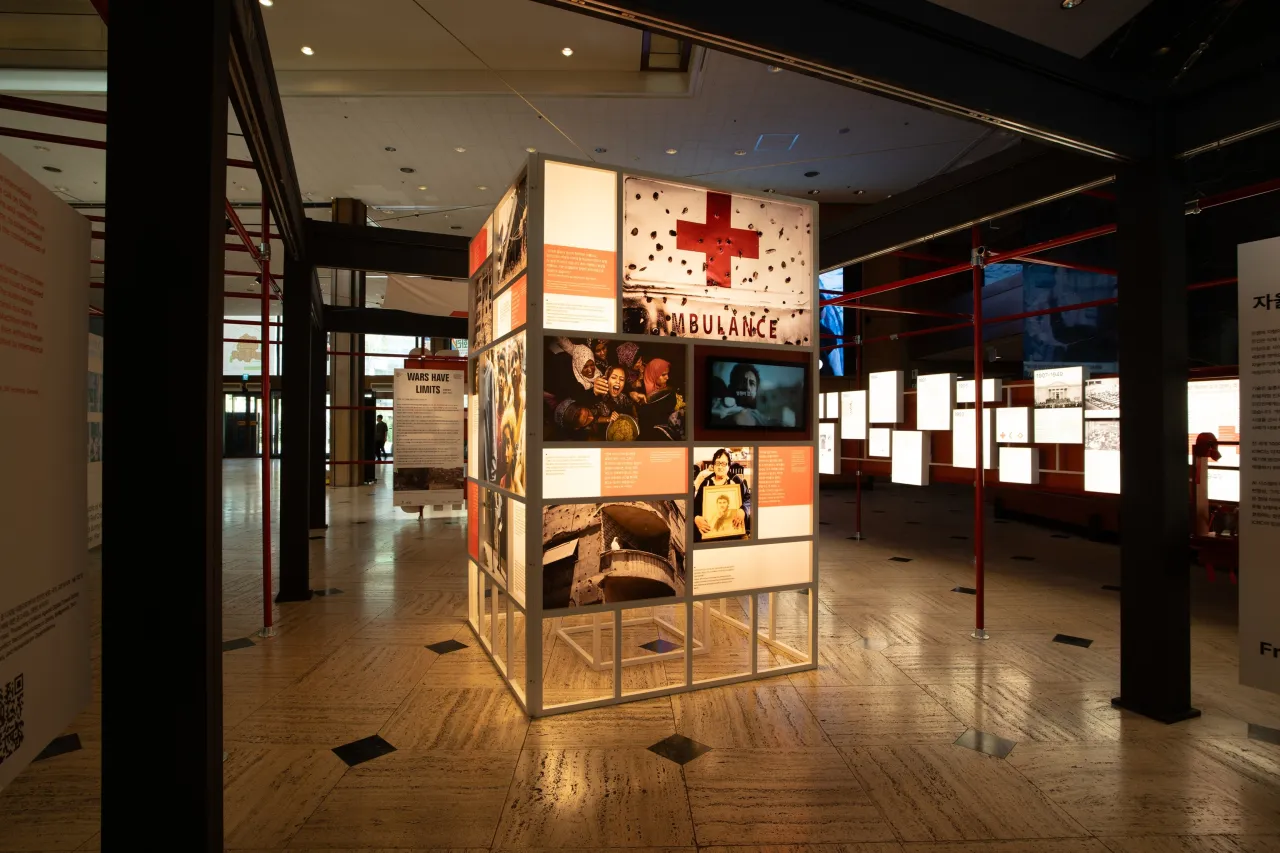 The exhibition's centerpiece is a light tower that illustrates how international humanitarian law is being challenged.