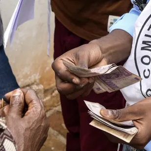 The ICRC financially assists Congolese people deported from Angola.