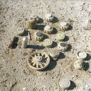 Various antipersonnel mines, 40mm grenade and part of mortar shell in Iraq.