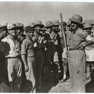 Word War II. British India. Group V. Italian prisoners of war camp. ICRC delegate with a group of detainees.