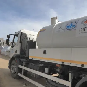 ICRC truck driving on road