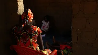 An ICRC employee visits a beneficiary at her home, where she recounts her experience and discusses her depression after her husband's death.