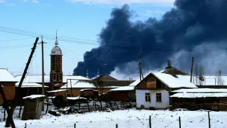 Oil refinery on fire in the outskirts of Grosny (Russia) as result of bombing raid.